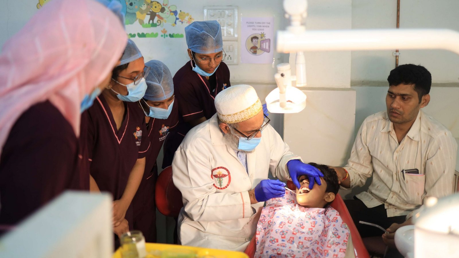 Oral-Examination-of-a-child-patient-scaled-1